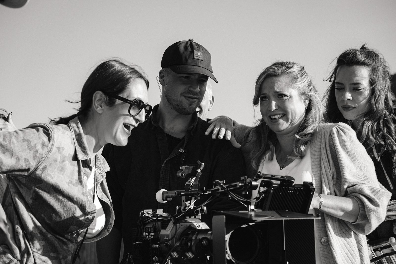 at the monitor with actresses