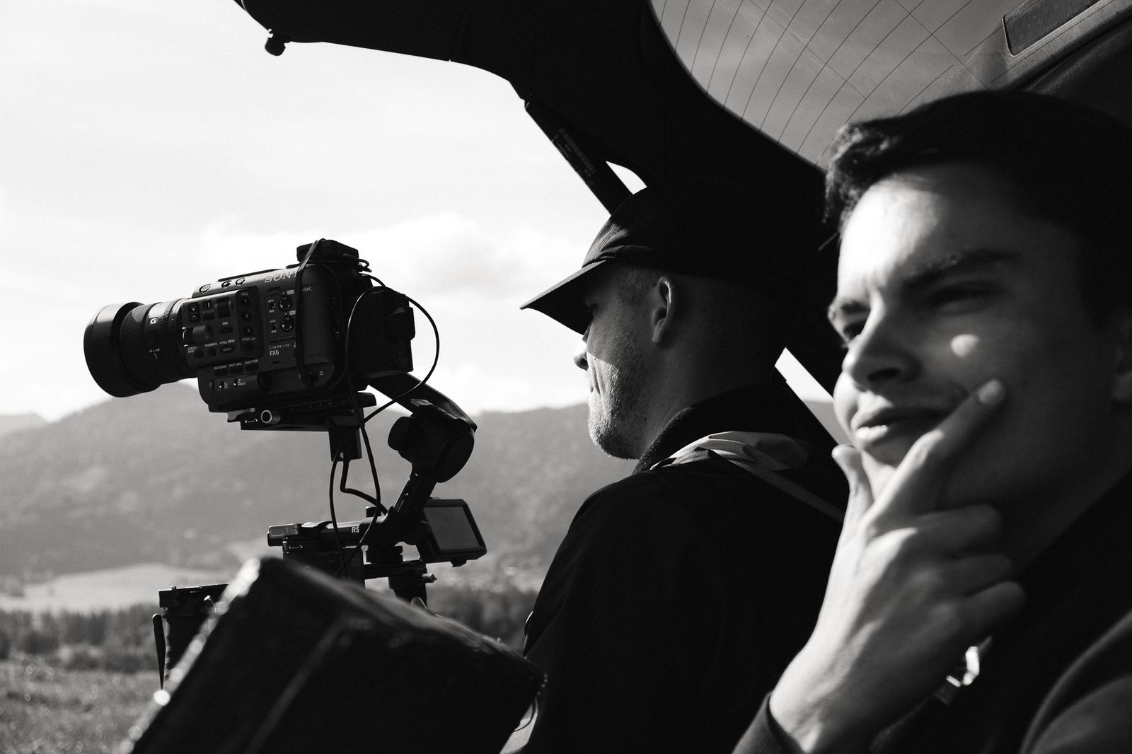 tracking shot from the car boot